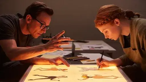 Animators working on principles of animation Animators working on principles of animation